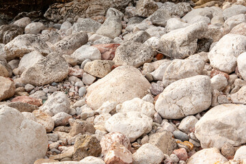 Background from stones, close-up. Stone beach for publication, poster, calendar, post, screensaver, wallpaper, postcard, banner, cover, website. High quality photo