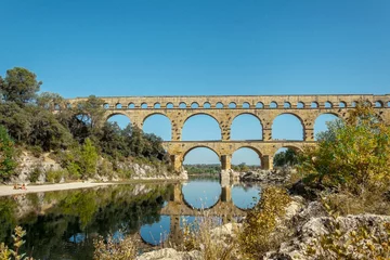 Poster de jardin Pont du Gard reflection of the Pont du Gard on the Gard river water