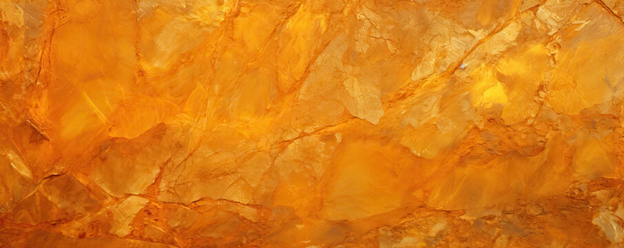 a background orange colored stone and gold with texture