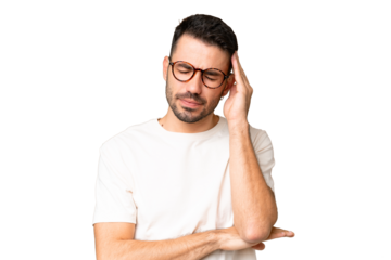 Young handsome caucasian man over isolated chroma key background with headache