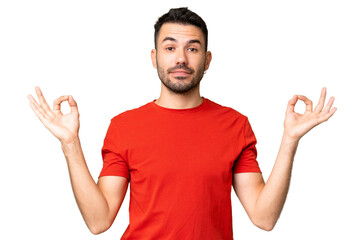 Fototapeta premium Young handsome caucasian man over isolated chroma key background in zen pose