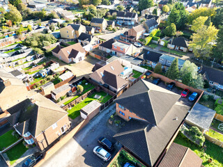 Fototapeta premium High Angle Beautiful Footage of North Luton Leagrave Town of England UK During Mostly sunny Day. The Footage Was Captured with Drone's Camera on November 7th, 2023