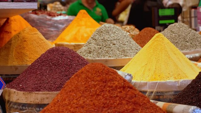Arabic Spices in Market . Selective blurring on piles of spices of different colors and flavors used in Turkish cuisine in Istanbul Egyptian spice market, called Misir Carsisi, in Turkey.