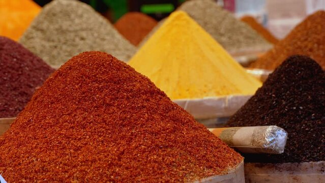 Arabic Spices in Market . Selective blurring on piles of spices of different colors and flavors used in Turkish cuisine in Istanbul Egyptian spice market, called Misir Carsisi, in Turkey.