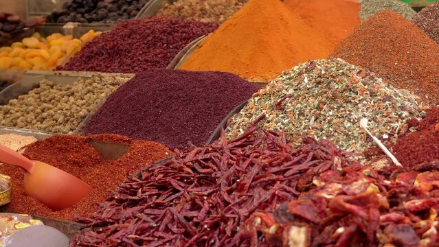 Arabic Spices in Market . Selective blurring on piles of spices of different colors and flavors used in Turkish cuisine in Istanbul Egyptian spice market, called Misir Carsisi, in Turkey.