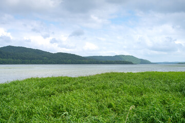 Fototapeta na wymiar Lake Toro, the largest lake in Kushiroshitsugen National Park, located on the eastern side of the park, Hokkaido, Japan