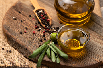 olive oil and on wooden background