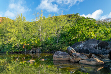 Green lagoon at Anse Lazio, scenic beach in Praslin island, Seychelles