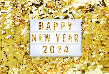 Happy New Year lightbox on shining golden background of tinsel confetti, ribbon. Light box with...