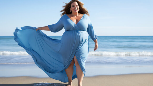 body positive, plus size woman enjoys summer day at the beach