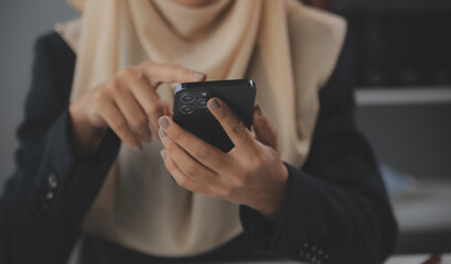 Business and lawyers discussing contract papers with brass scale on desk in office. Law, legal services, advice, justice and law concept picture with film grain effect