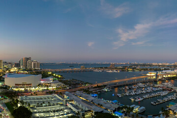 Miami Brickell bay harbor with many luxury yachts and sailboats. Docking place for water transport in Florida, USA