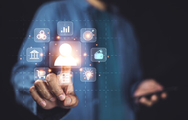 Businesspeople touching on screen to target customer. Target customer, buyer persona, customer behavior concept. Marketing plan and strategies. Personalization marketing, customer centric strategies.