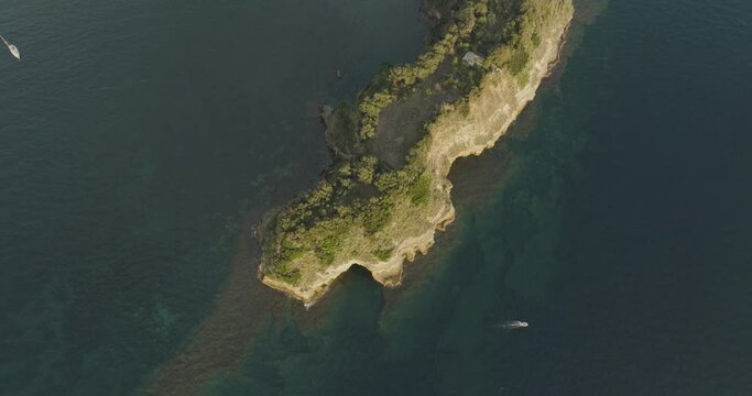 Aerial view of Punta Serra, a small promontory with high cliffs on the Procida island, Flegree Islands archipelagos, Naples, Campania, Italy.