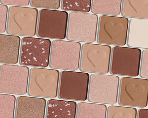 Trend pattern with refill eye shadow swatches, beige brown natural colors on light background. Eyeshadows powder for make up, shiny and matte, minimal aesthetic photo, pastel color, view, flat lay