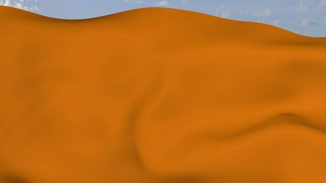 Loop der orangene Fahne wehend im Wind als Nahaufnahme 4K