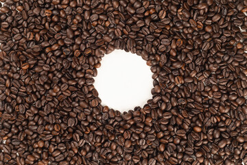 Top view illustration of coffee beans isolated on a white background in a round shape to use for text or advertising.