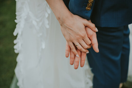 bride and groom hands