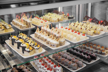 Cakes on a showcase in a restaurant