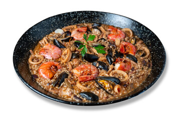 Top view of a seafood paella isolated from transparent background