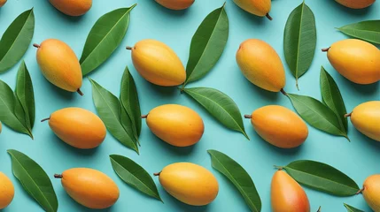 Zelfklevend Fotobehang Diagonal pattern from ripe juicy mangoes on mint blue background. Creative minimalist flat lay. Vitamins vegan healthy diet tropical vacation fashion concept. Poster wallpaper template © HN Works