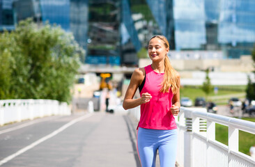 Beautiful woman running in an urban setting