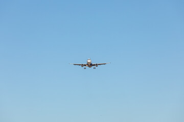 Fototapeta na wymiar Flying Plane in the sky
