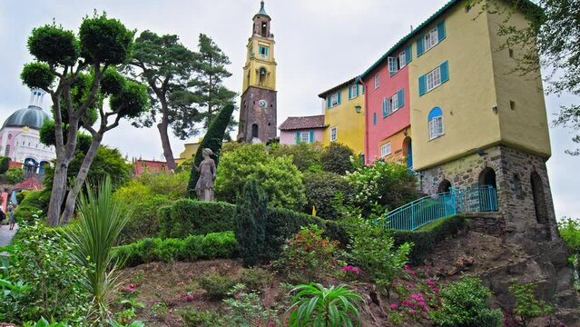 Panoramic view of The Dome and Tower with a clock in Portmeirion North Wales. Colourful houses in baroque style tourist village in Gwynedd, North Wales.