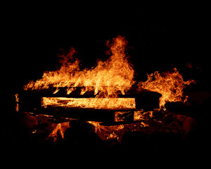 Bonfire on beach, burning pallets and drift wood