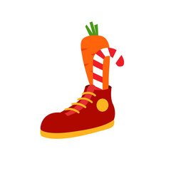 Childrens boot with carrot and candy for Saint Nicholas day. Sinterklaas day.