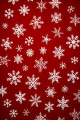 Red background with white snowflakes on it's sides.