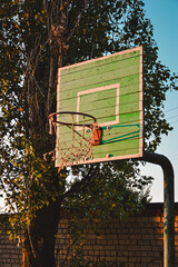 Basketball hoop in the park, closeup shot of an old basketball hoop