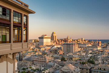 Aerial view of the downtown of Genoa at the sunset seen from Castelletto with famous public elevator