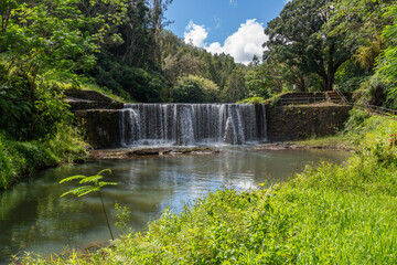 A stone dam with beautiful waterfall in Kauai, Hawaii, United States.
