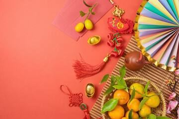 Chinese New Year celebration with traditional decorations for Spring festival on red background. Top view, flat lay