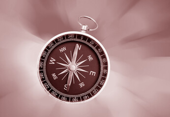 photo of round compass as symbol of tourism with compass, travel with compass and outdoor activities with compass