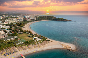 Fototapeta premium Okurcalar holiday tourist region. Summer vacation on beach, Hotels sea, beach, coast, water sports and sun. Drone Aerial view. Mediterranean, Manavgat - Alanya - TURKEY