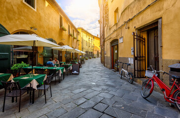 Old cozy street in Lucca, Italy. Architecture and landmark of Lucca. Cozy cityscape of Lucca.