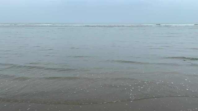 waves on the beach at Himchori in Coxs Bazar, Bangladesh 