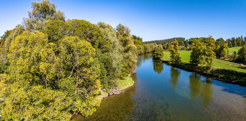 Loisach River in Bavaria. Trees around. Aerial