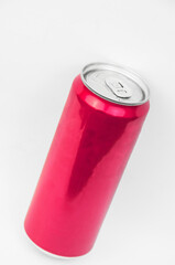 aluminum red can for cold drinks. tin can making concept. soda in red tin can on white texture