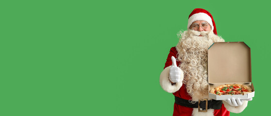 Santa Claus holding box with tasty pizza and showing thumb-up on green background with space for text