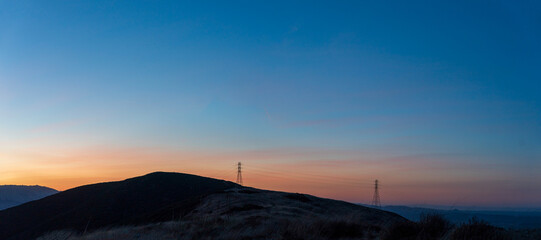 Sunset, sunrise in the Mountains with power utility pole