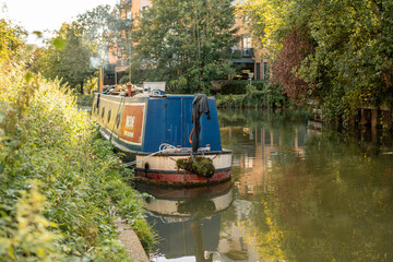 A house boat docked on Stort River in Bishop's Stortford in England
