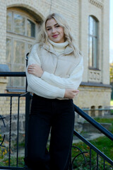 Portrait of a young beautiful blonde with long hair