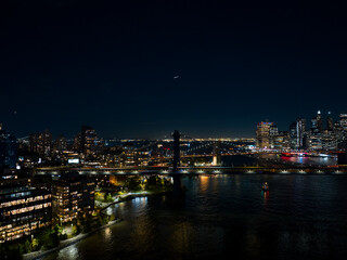 Fototapeta na wymiar Night aerial photo Dumbo New York. View of river and bridges