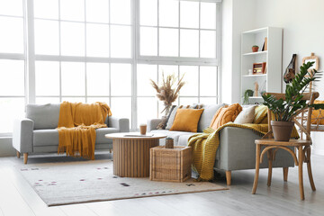 Interior of living room with grey sofas