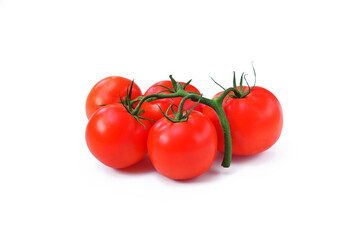 fresh tomatoes on a branch isolated on white background close up