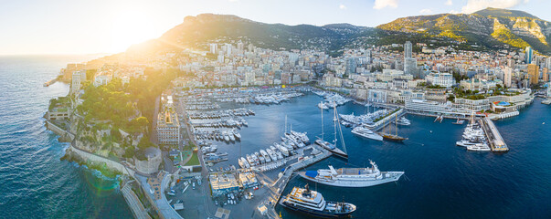 Sunset view of Monaco, a sovereign city-state on the French Riviera, in Western Europe, on the Mediterranean Sea - obrazy, fototapety, plakaty