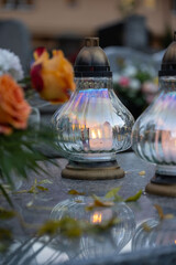 Gravelights, candles on the grave on All Saints' Day